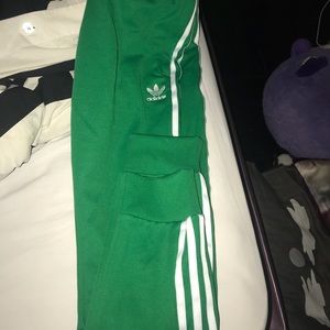 Green adidas pants